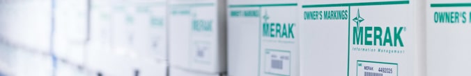 Photo of stacked archive boxes from Merak