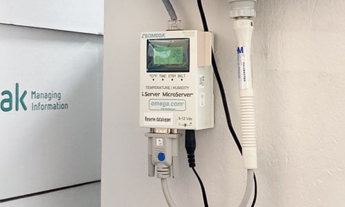 Close-up of device measuring humidity and temperature in the climate chamber