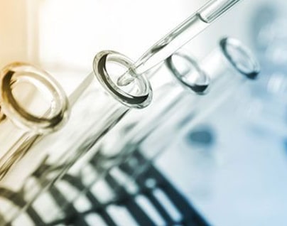 A liquid is put into test tubes with a pipette