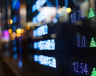 Colourful image of an LED sign with digital numbers