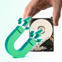 A computer hard drive with an icon of a magnet next to it